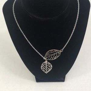 Silver color double leaf 18” necklace. NWOT